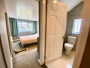 Bedroom One- click for photo gallery